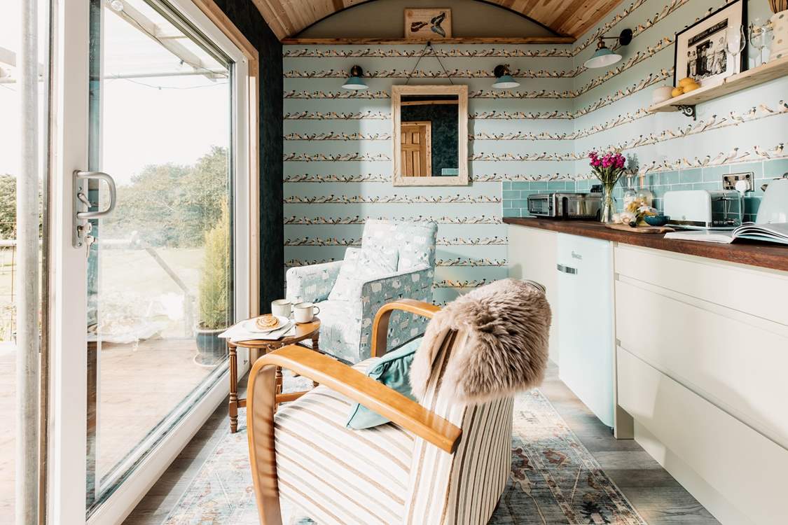 Wholesome interiors adorn the inside space, echoing the natural outside world.