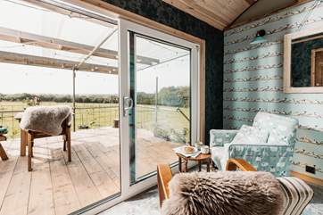 Admire the unspoilt view, snuggled inside with a cuppa.