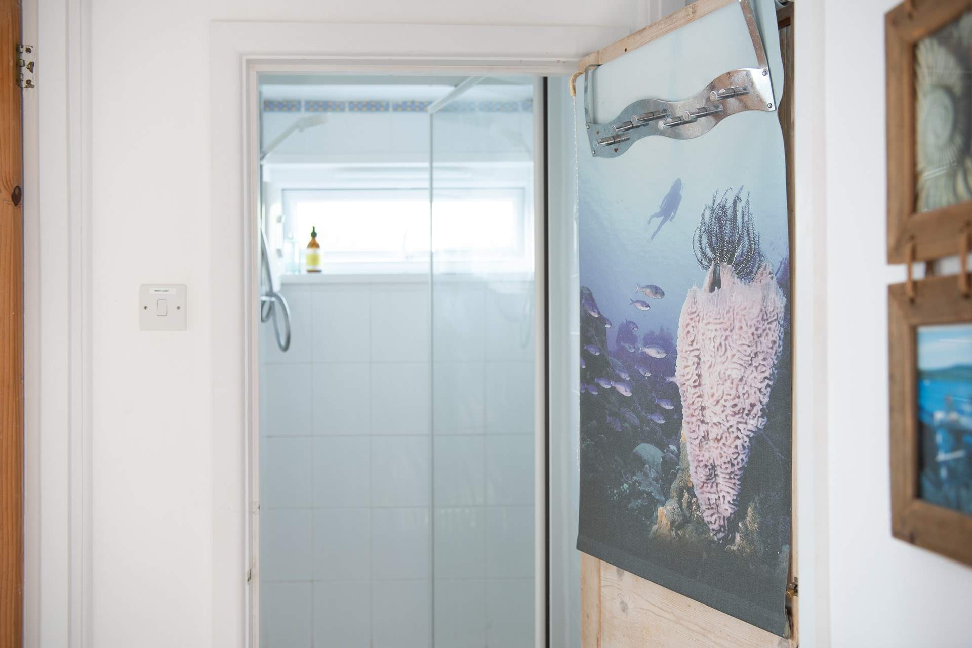 There is a cute tiny cupboard shower next to the single bedroom on the first floor.