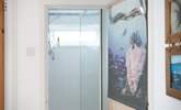 There is a cute tiny cupboard shower next to the single bedroom on the first floor. - Thumbnail Image