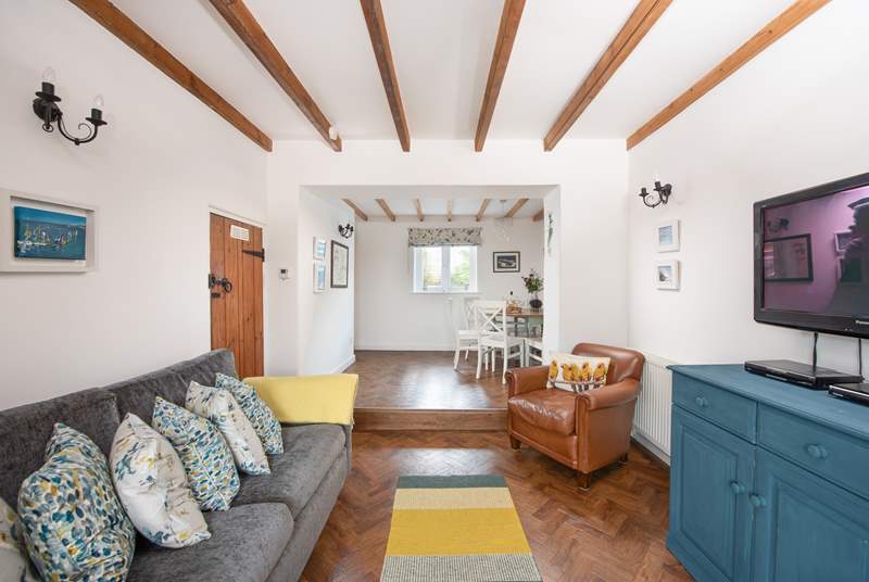 The second sitting-room also has a small dining-area which is perfect for quiet early morning breakfasts or family board games (please take care with the step).