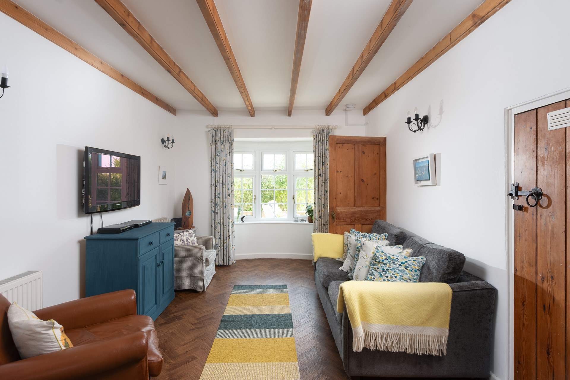 Enjoy quiet time in the second sitting-room.