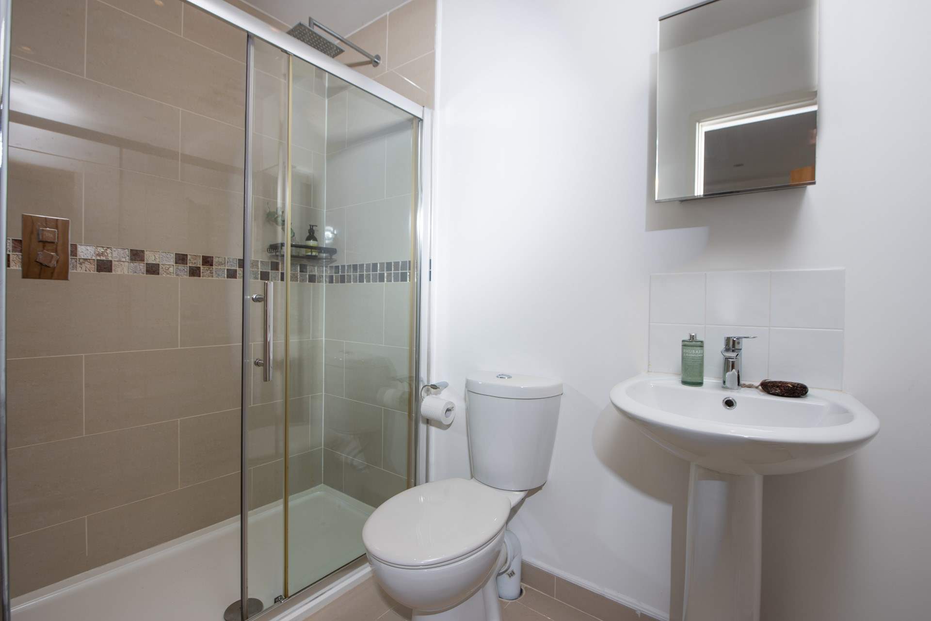 The en suite shower-room to Bedroom 1.