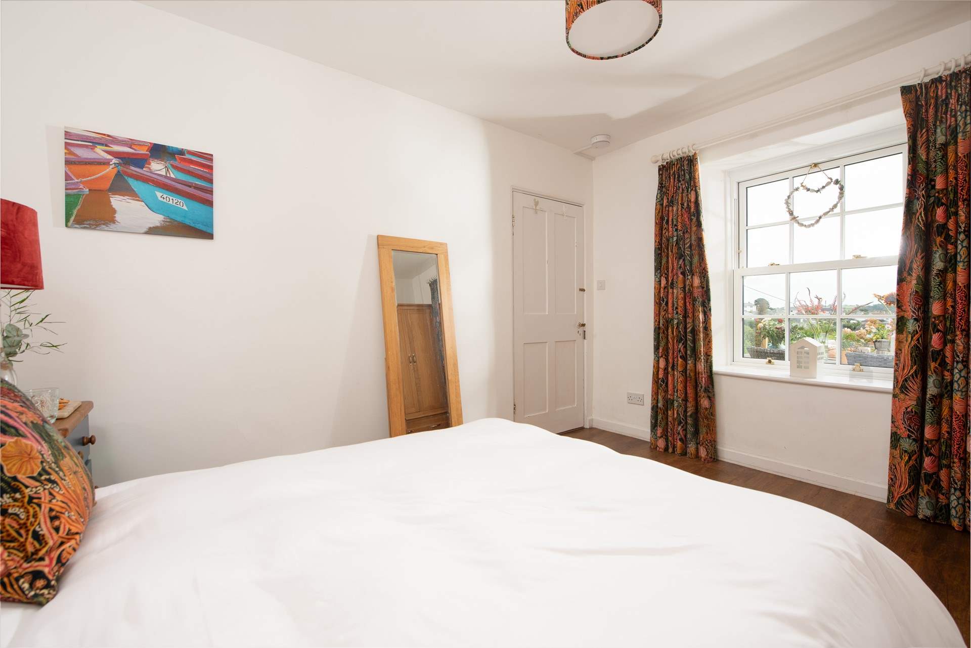 Bedroom 2 looks over the terrace.