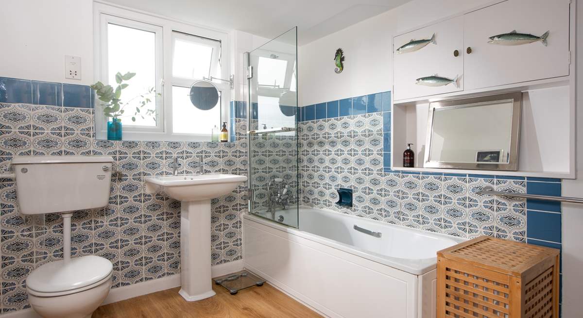 The family bathroom with shower attachment. 