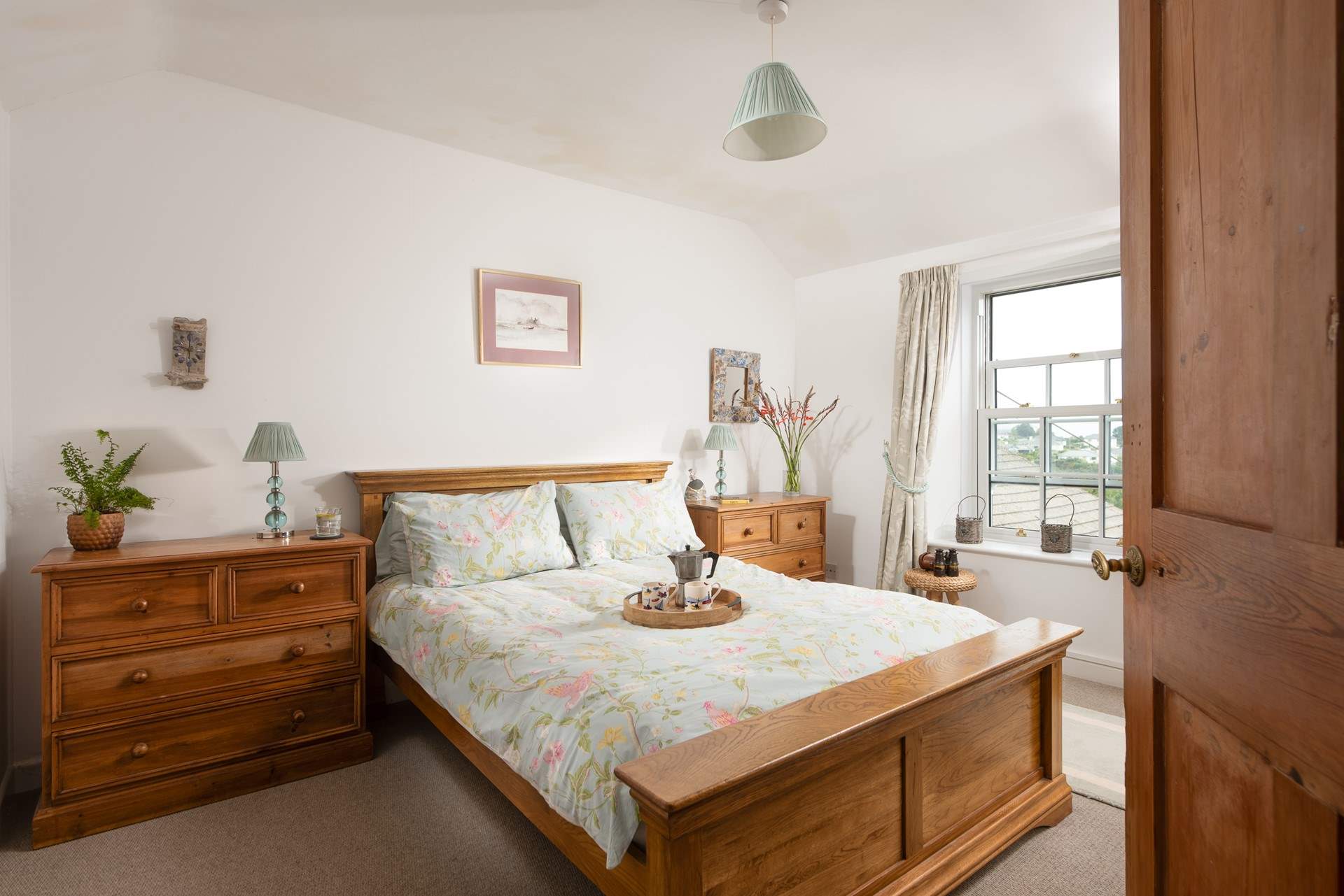 The main bedroom on the first floor is is at the front of the house.