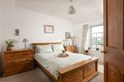 The main bedroom on the first floor is is at the front of the house.