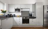 The gorgeous kitchen is very well equipped.  - Thumbnail Image