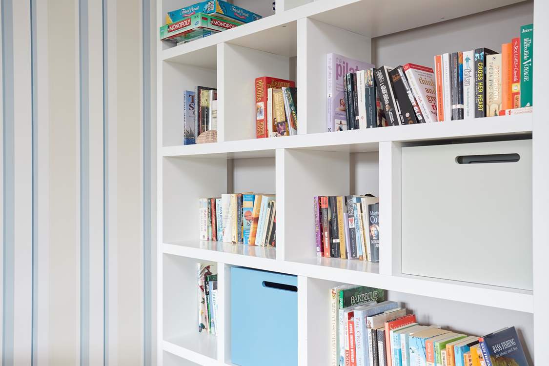 A selection of games and books to enjoy during your holiday.