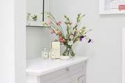The dressing area to the main bedroom with access to en suite bathroom has all the space you could need.