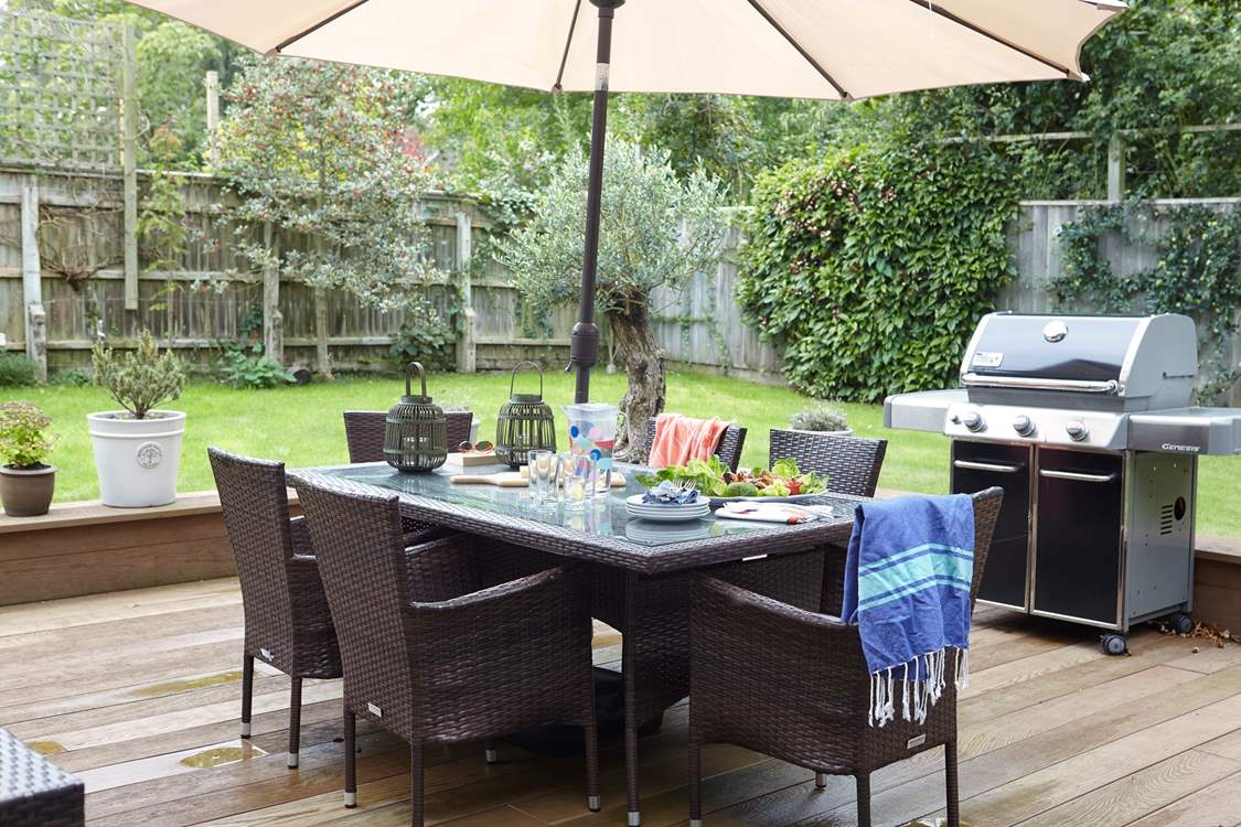 The outdoor area is very inviting with an extensive patio area, ideal for entertaining.