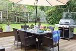 The outdoor area is very inviting with an extensive patio area, ideal for entertaining.