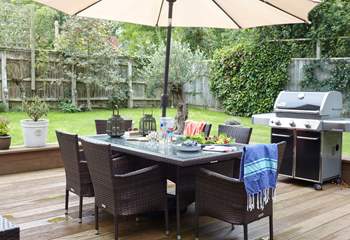 The outdoor area is very inviting with an extensive patio area, ideal for entertaining.