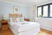 First bedroom on the ground floor with a view of the rear garden.