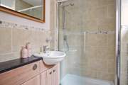The en suite shower-room to bedroom 1.