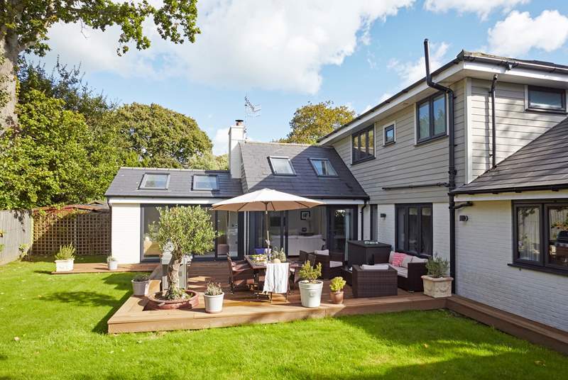 A sunny south-facing garden with space to dine and lounge together.