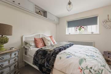 A warm and welcoming bedroom.