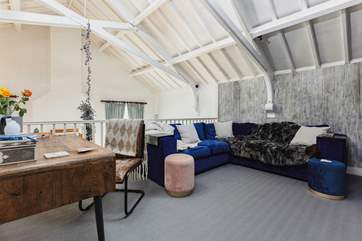 An inviting sofa to relax on in the snug/office/TV room.