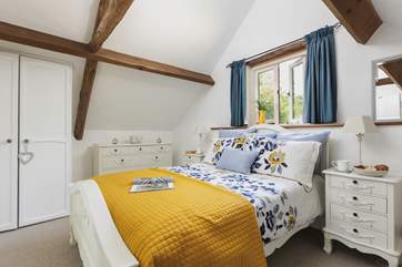 Bedroom 2 has a fabulous vaulted ceiling and offers the perfect spot to retreat to after a day of exploring!