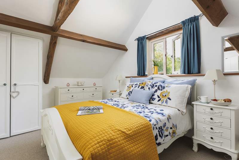 Bedroom 2 has a fabulous vaulted ceiling and offers the perfect spot to retreat to after a day of exploring! 