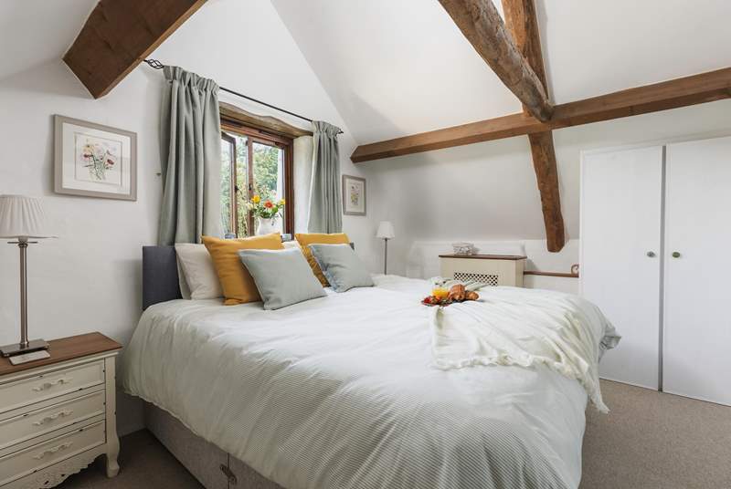 Bedroom 2 with a 'zip and link' option also enjoys space and a vaulted ceiling!