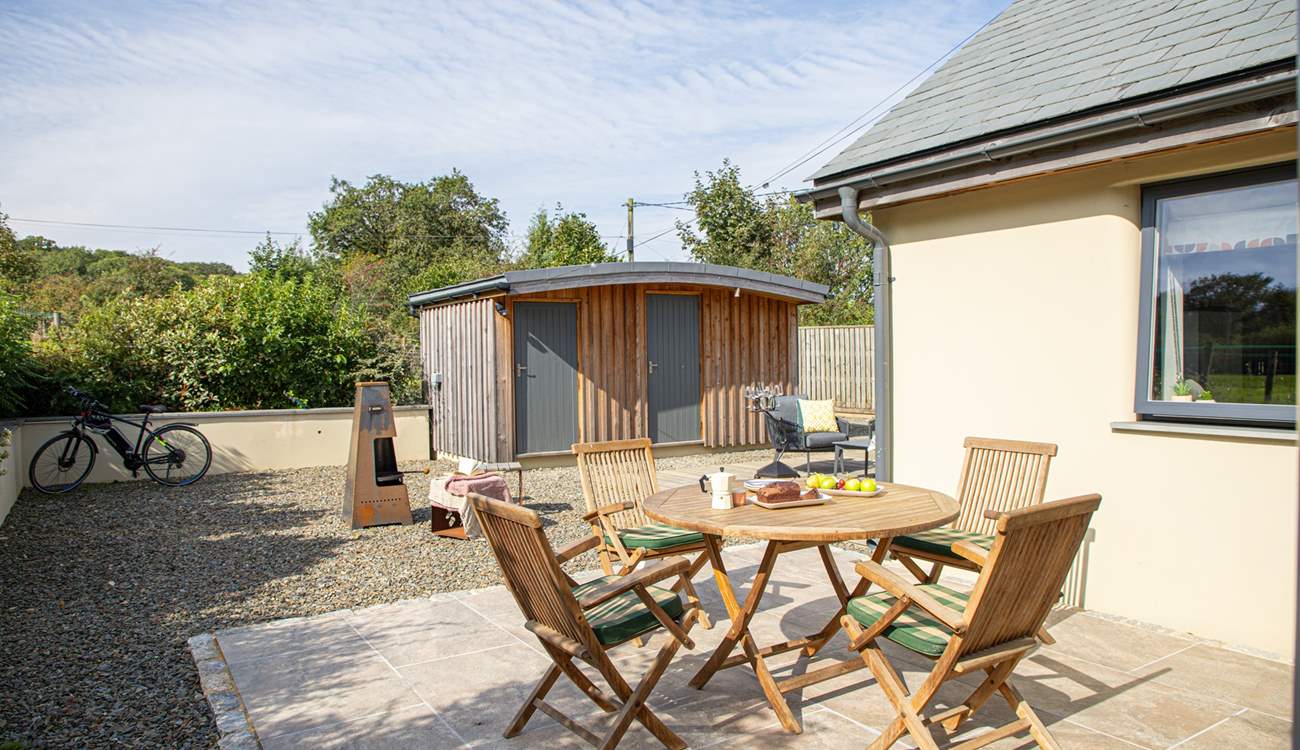 There is a bike store as well as a boot-room.