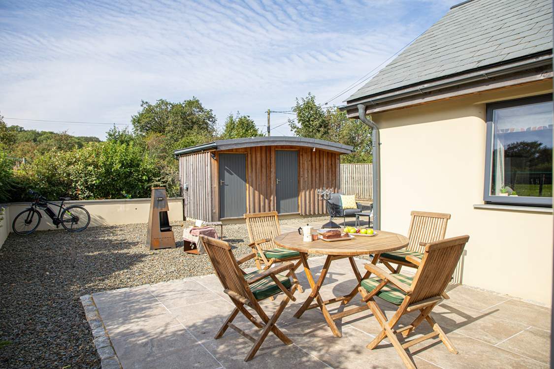 There is a bike store as well as a boot-room.