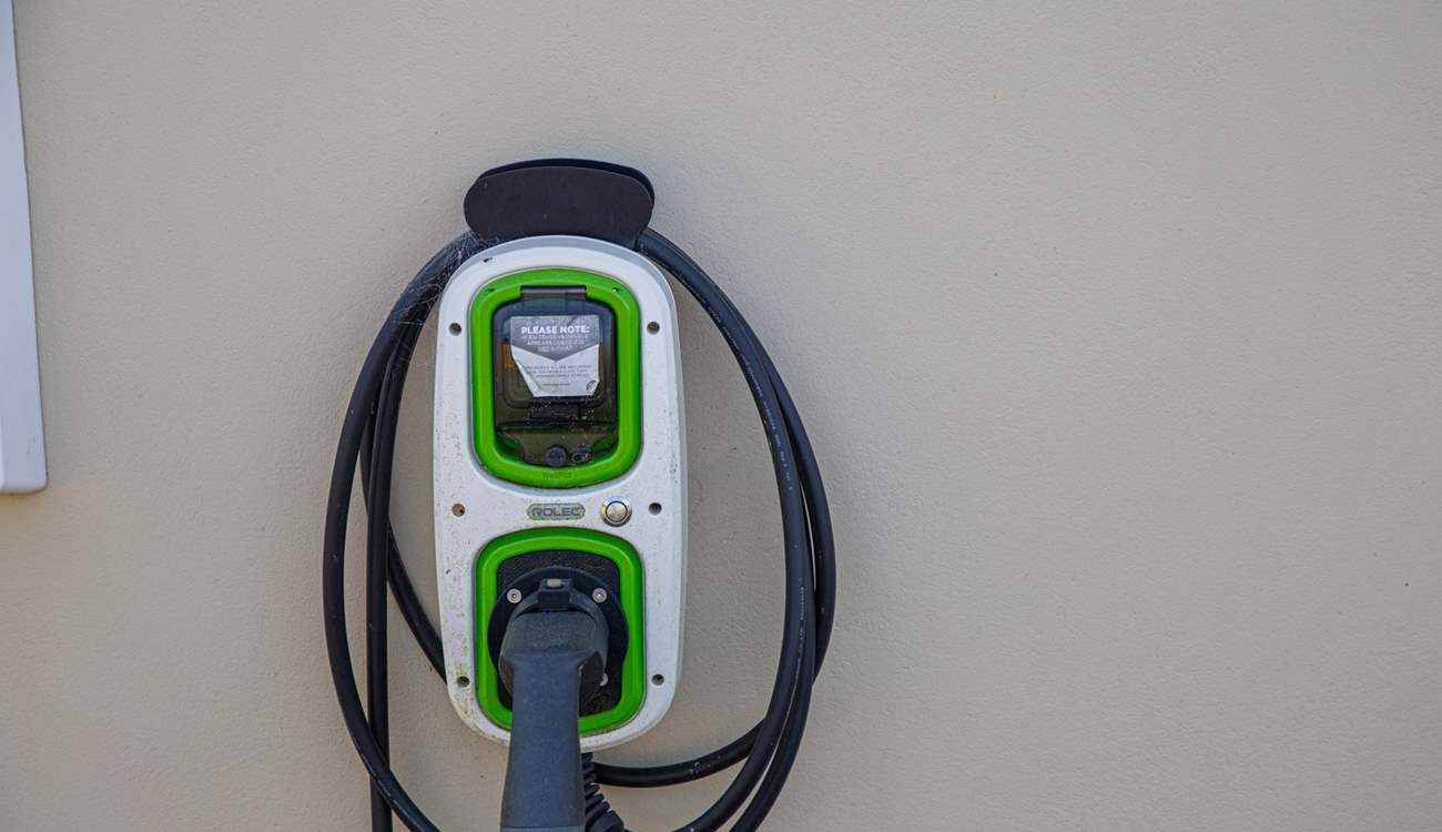 The car charger is attached to the side of Buzzards Rise. Payable on site directly to the owner.