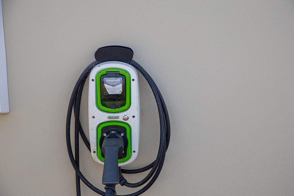 The car charger is attached to the side of Buzzards Rise. Payable on site directly to the owner.