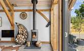 The log-burner makes the cosiest of welcomes. - Thumbnail Image