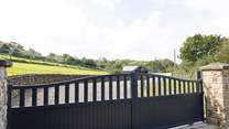 Arrive at the gates and follow your private drive to Buzzards Rise.