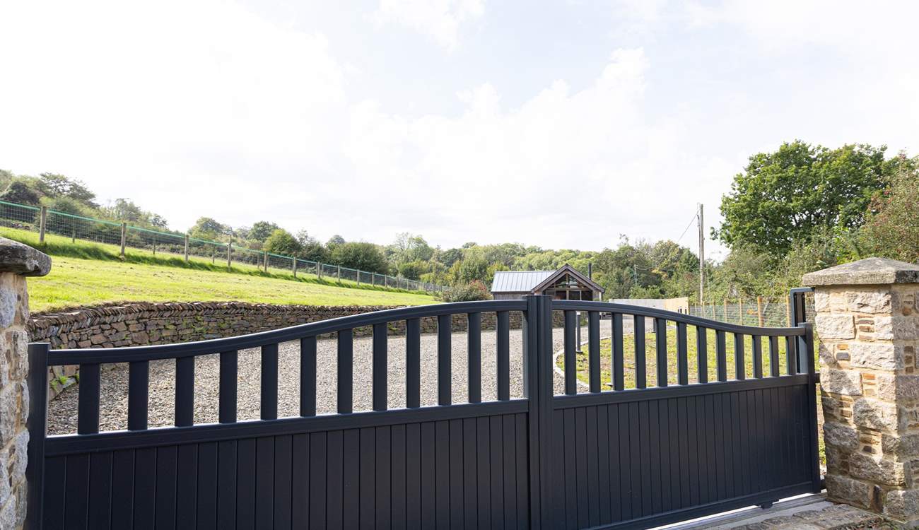 Arrive at the gates and follow your private drive to Buzzards Rise.