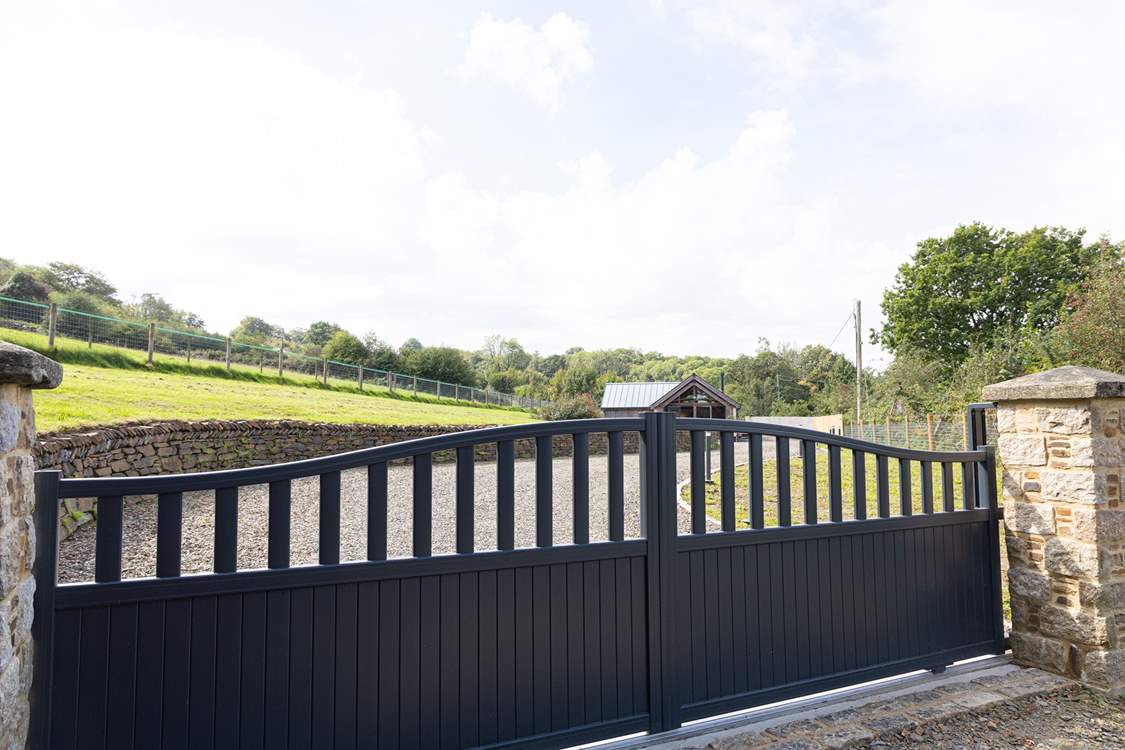 Arrive at the gates and follow your private drive to Buzzards Rise.