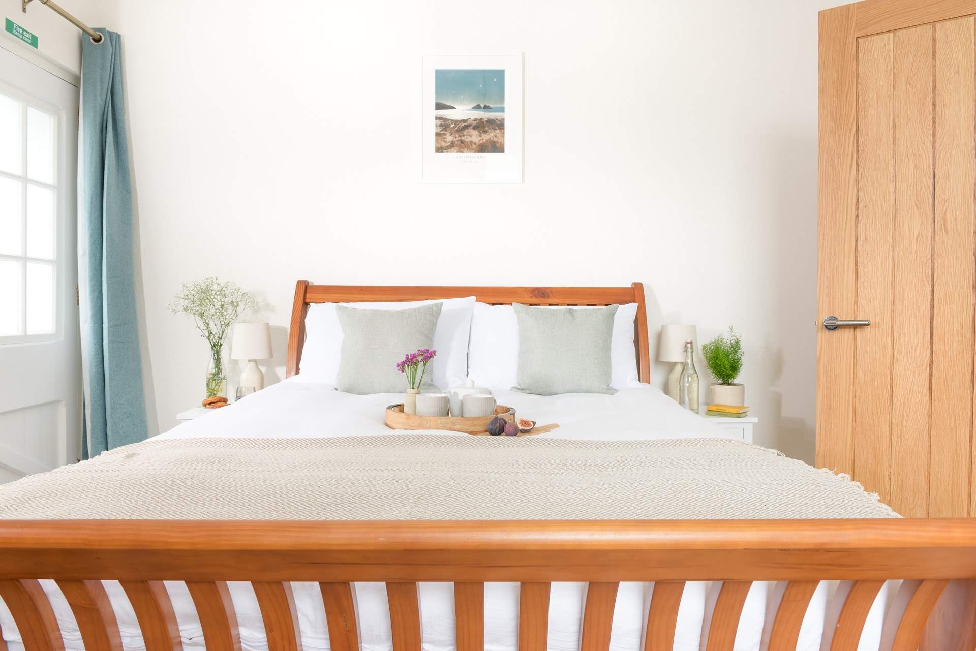 A wonderful sleigh bed awaits in the first bedroom.