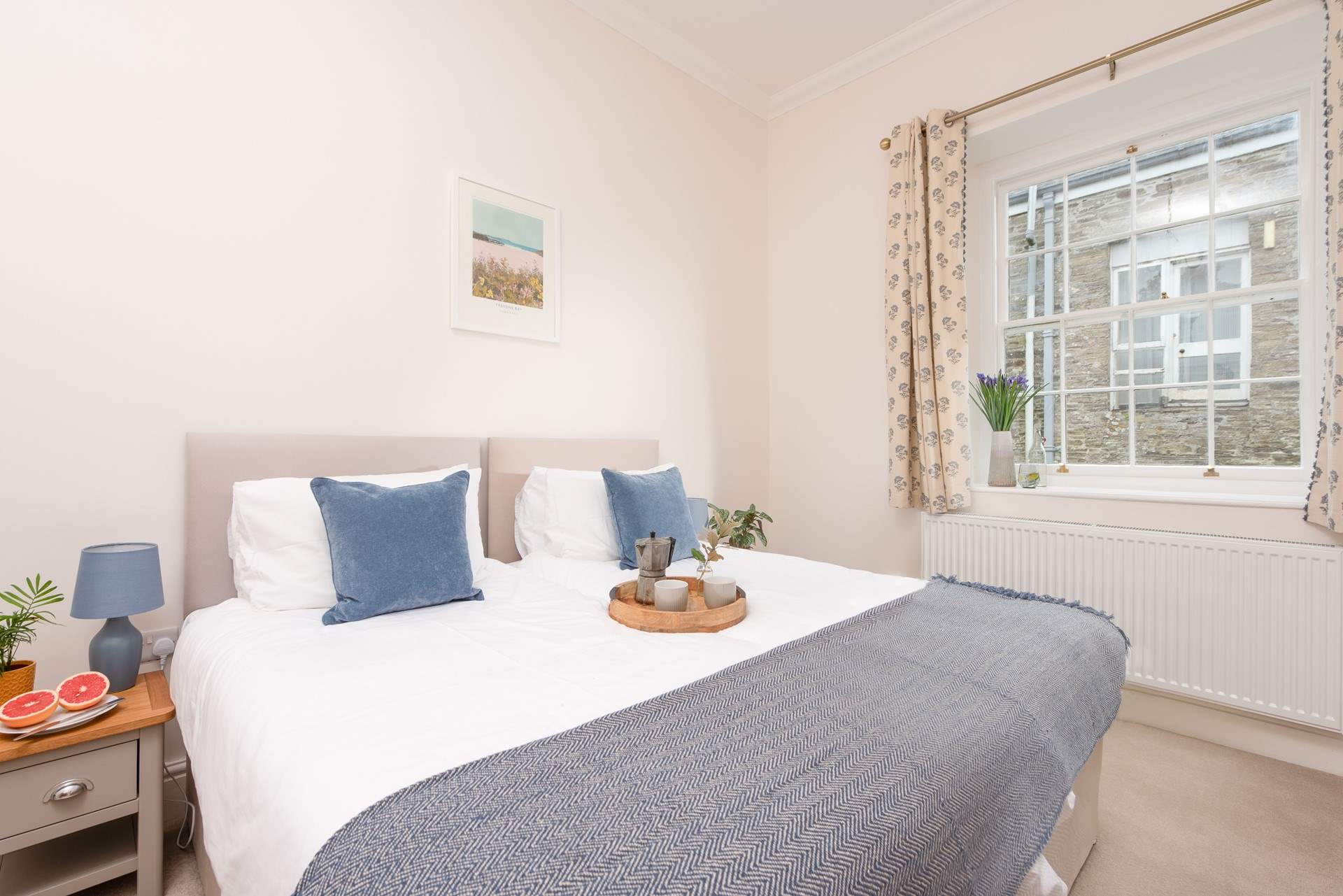 Calming shades of blue in the twin bedroom.