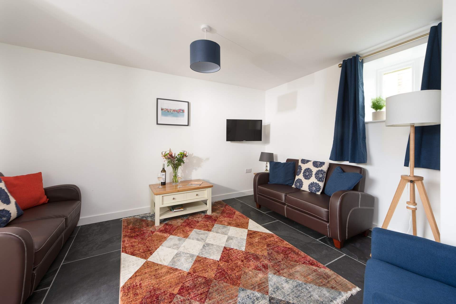 The living-room offers plenty of room to spread out at the end of day.