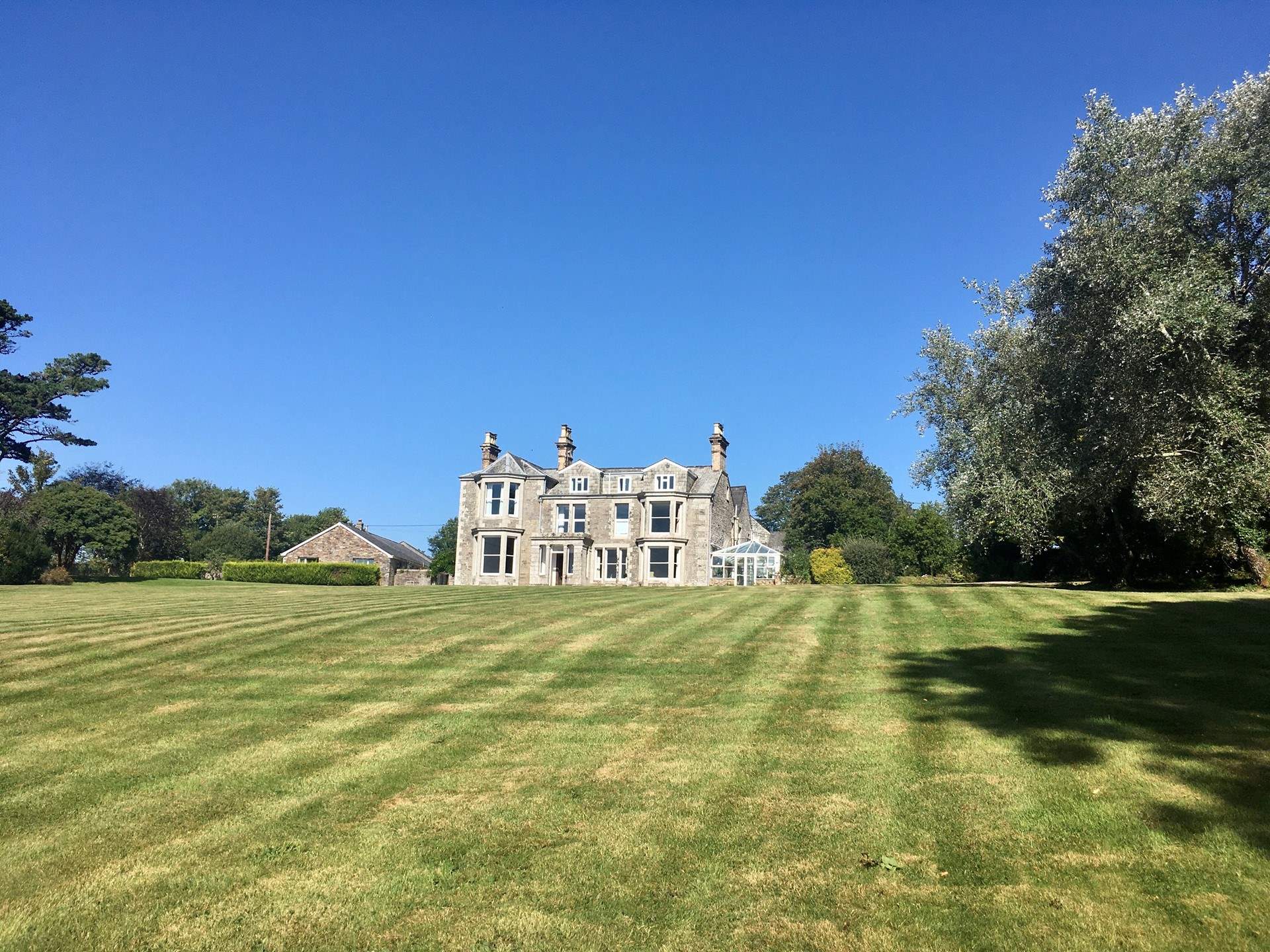 Laundry Cottage is set within the grounds of Tredethy House - guests are more than welcome to explore the garden and historic woodlands.