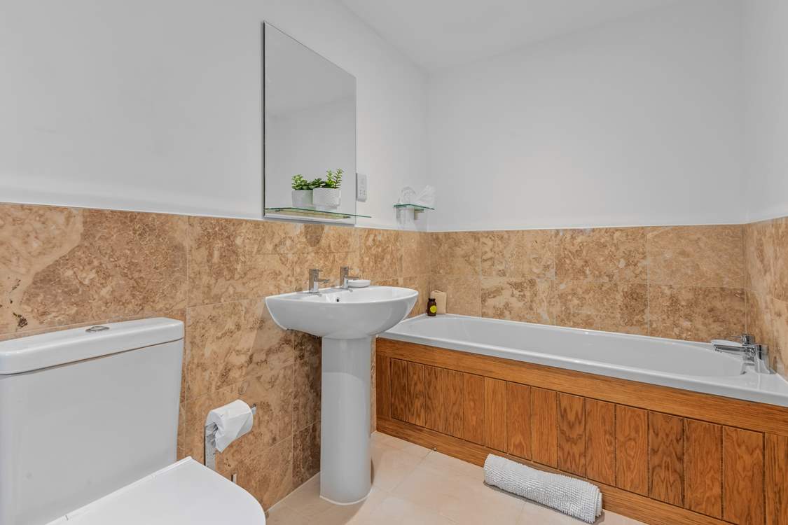 Enjoy a lovely soak with a glass of something tasty.