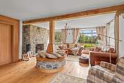 The spacious living-room is the perfect place to arrange tomorrow's adventures.