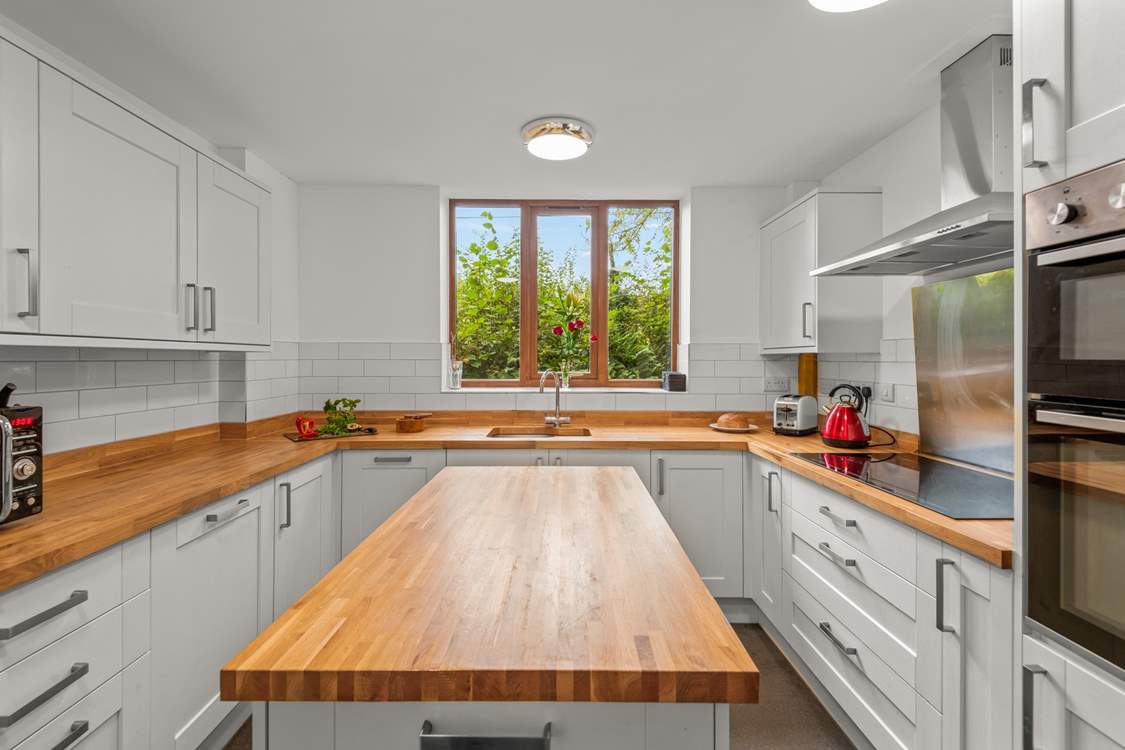 The kitchen is fully equipped to whip up a feast.