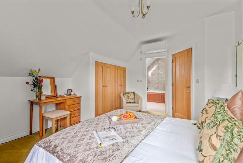 Bedroom four is light and airy.