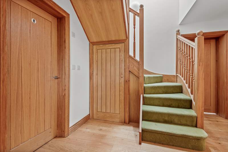 The stairs from the entrance hall lead you to bedroom four on the first floor.