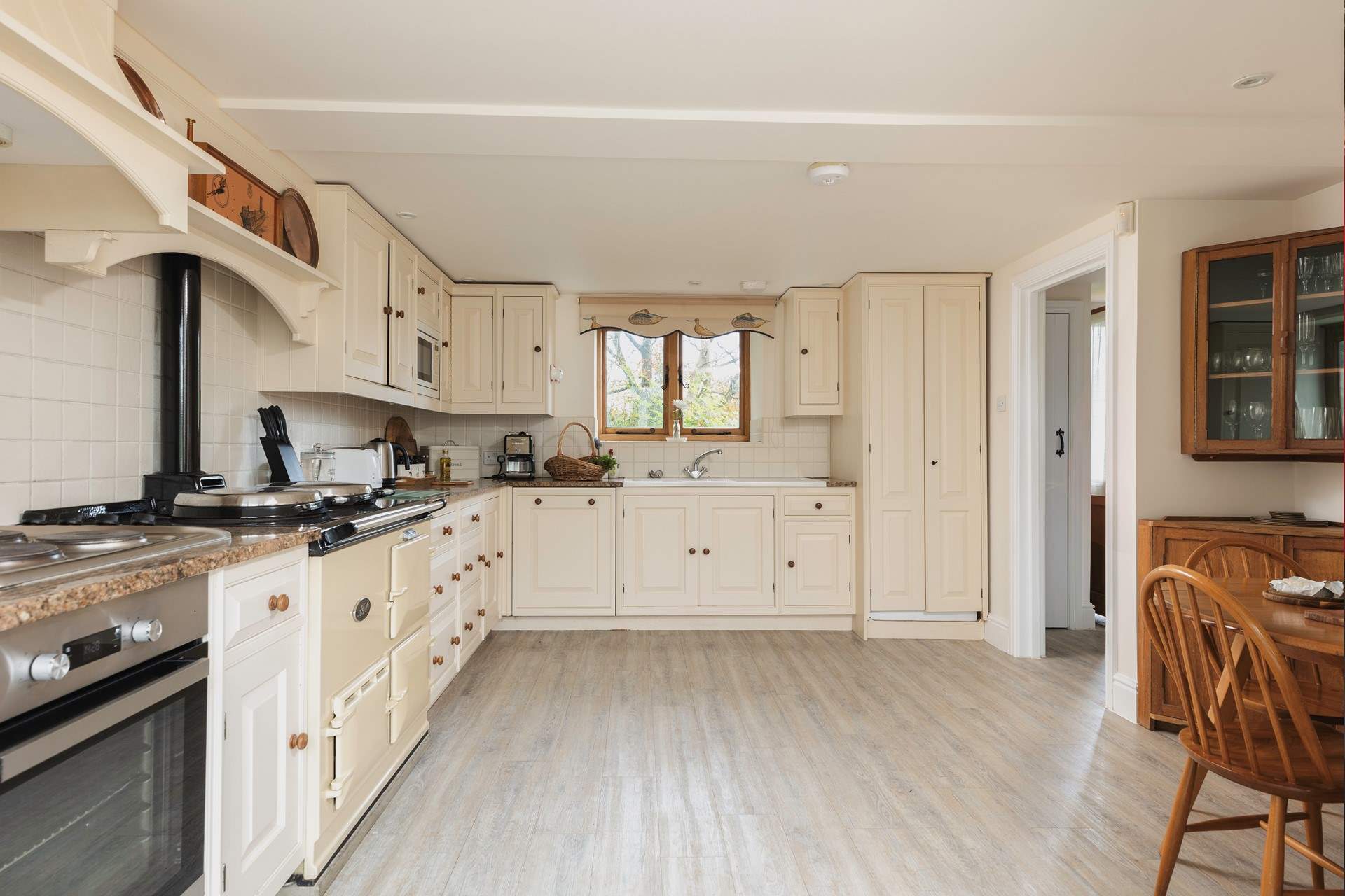 The kitchen leads onto the conservatory.