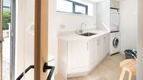 All you need in a utility-room, located on the lower ground floor. The outside shower, available during the summer months, is ideal for rinsing wetsuits and sandy dogs. 