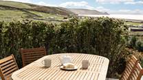  Take tea and cake on the patio in the sunshine or a sundowner later in the day and soak up the enchanting surroundings. 