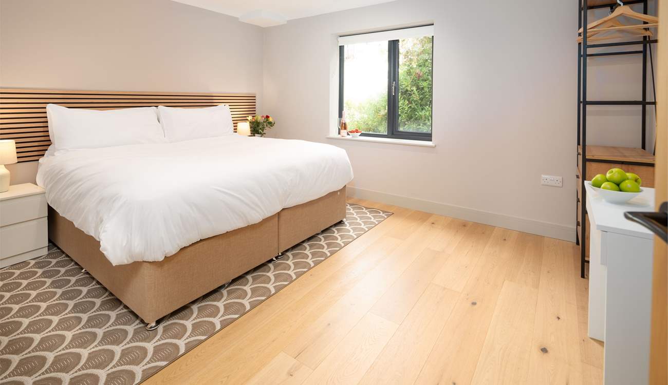 Spacious Bedroom 4 on the ground floor with a 'zip and link' bed. Kindly let us know when booking if you would like it made up as a super-king double or twins. 