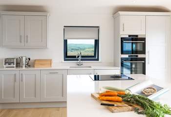 Who wouldn't want to be the holiday chef in this well-equipped, stylish kitchen with gorgeous sea and countryside views. 