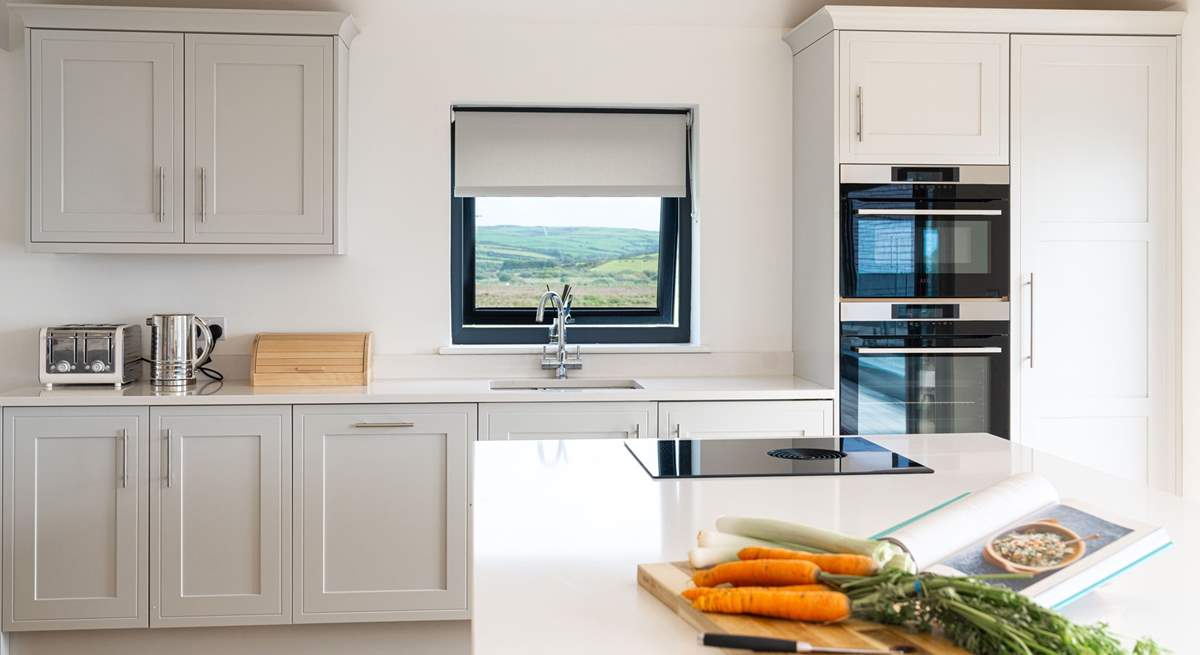 Who wouldn't want to be the holiday chef in this well-equipped, stylish kitchen with gorgeous sea and countryside views. 