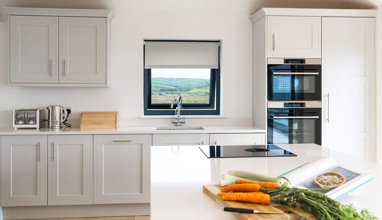 Who wouldn't want to be the holiday chef in this well-equipped, stylish kitchen with gorgeous sea and countryside views. 
