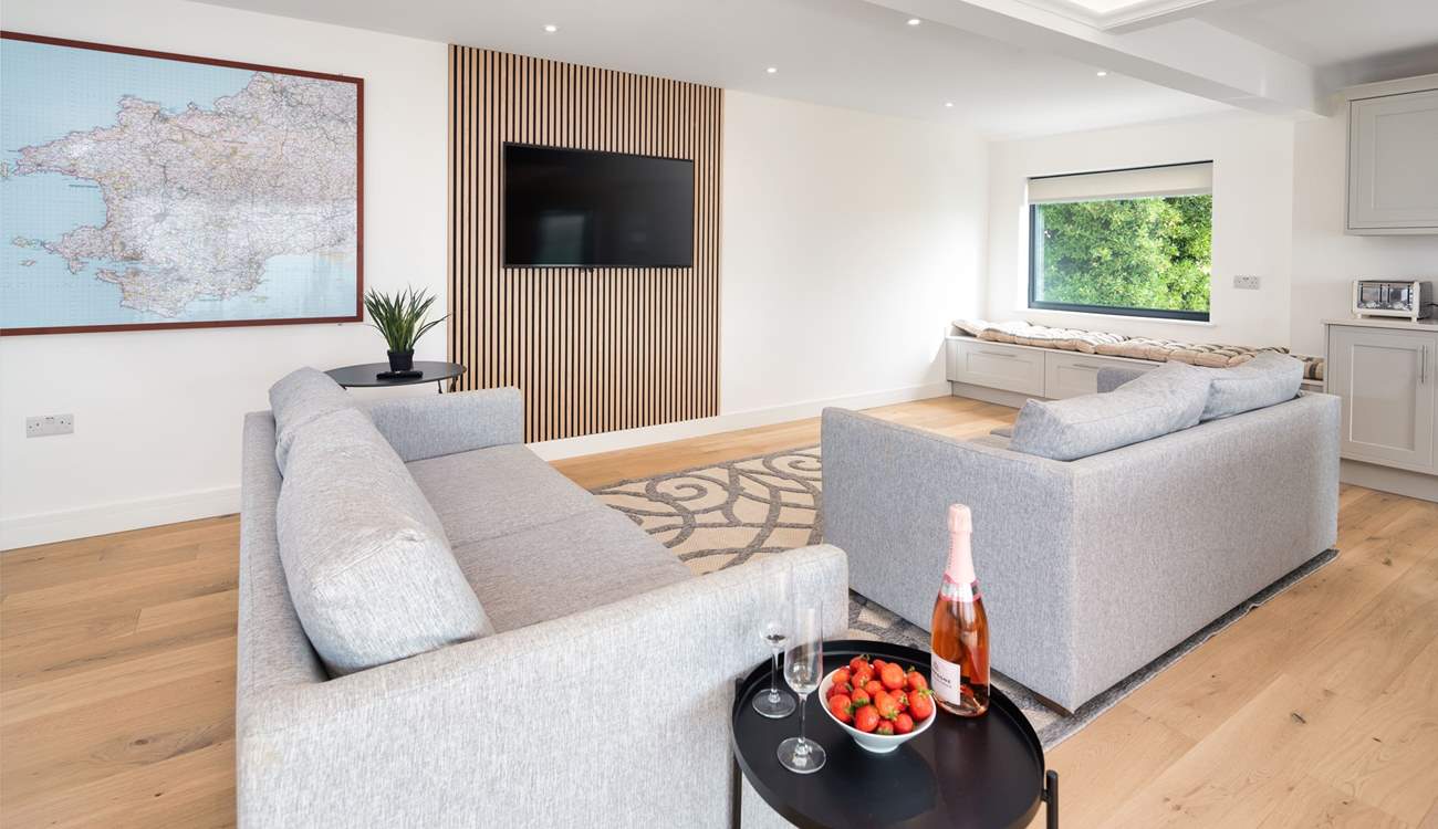 After a day on the beach relax together for a movie night.